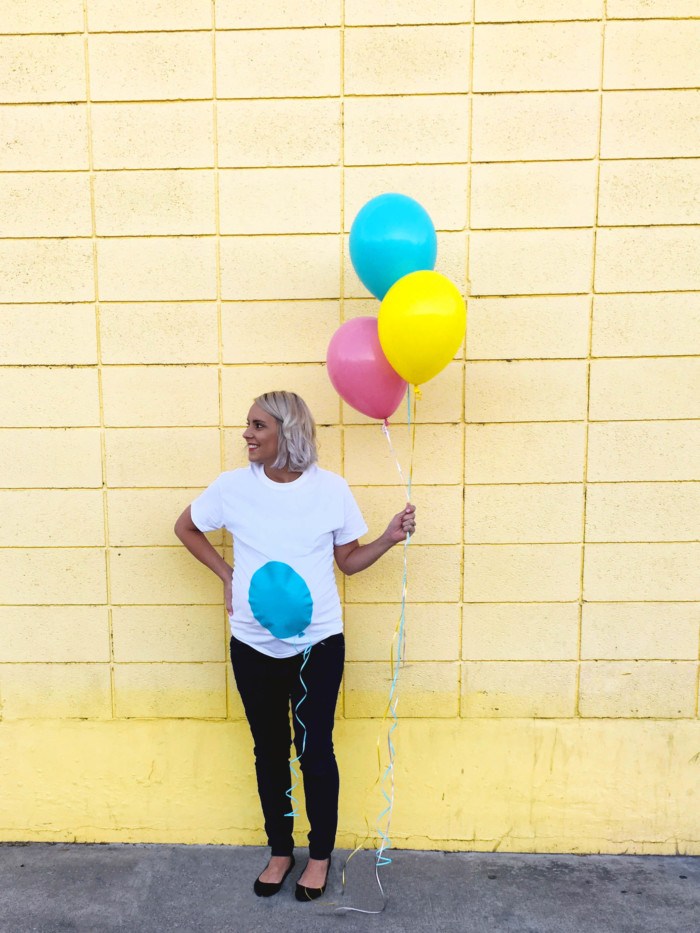 White Shirt painted to make baby bump look like balloon